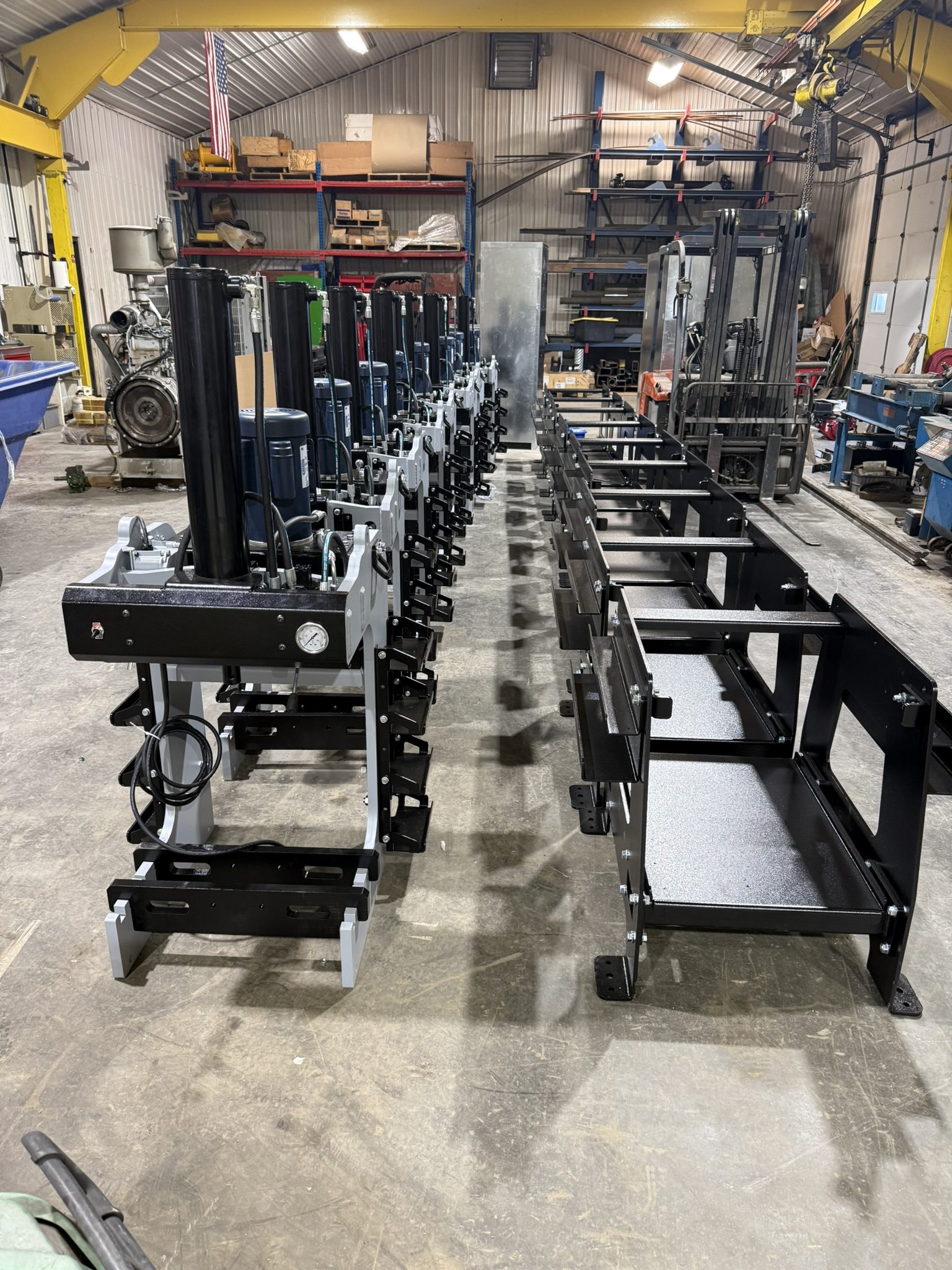 Industrial workshop with machinery and equipment lined up.