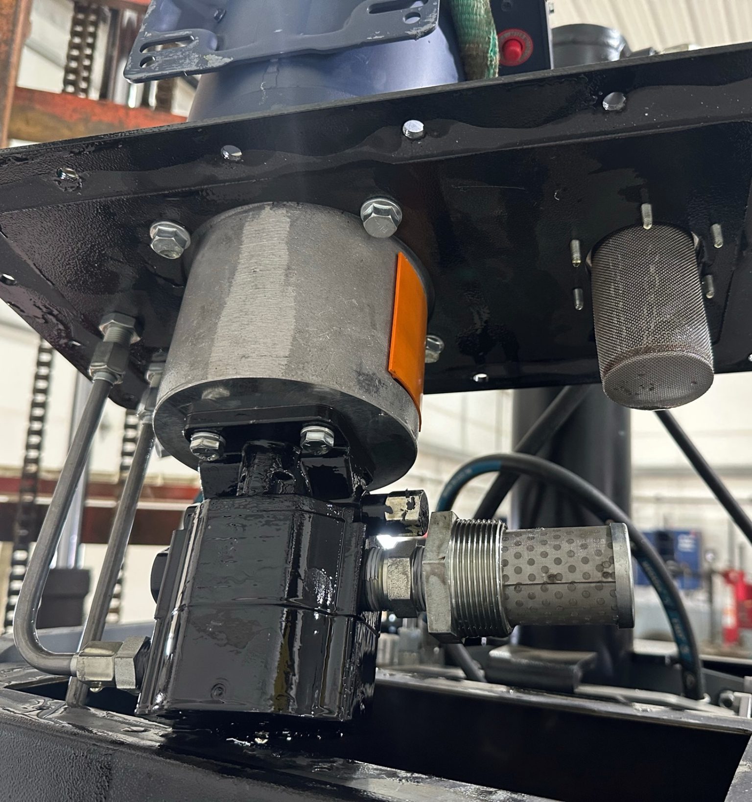 Hydraulic system components with metal connectors.